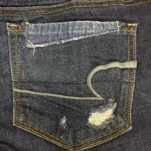 American Eagle distressed skinny’s